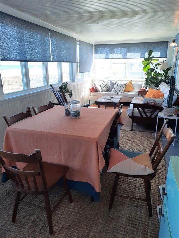 77 Gurnet Road, Unit 77 Duxbury, MA 02332 - Photo 4 of 15 a view of a dining room with furniture