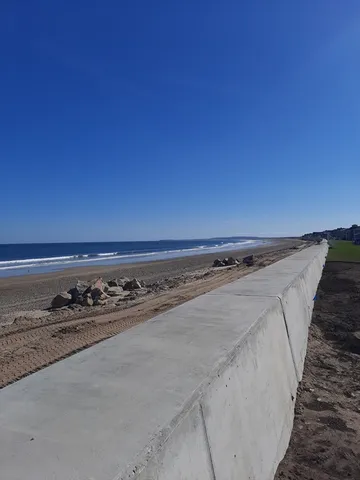 a close up of a fireplace with wooden floor