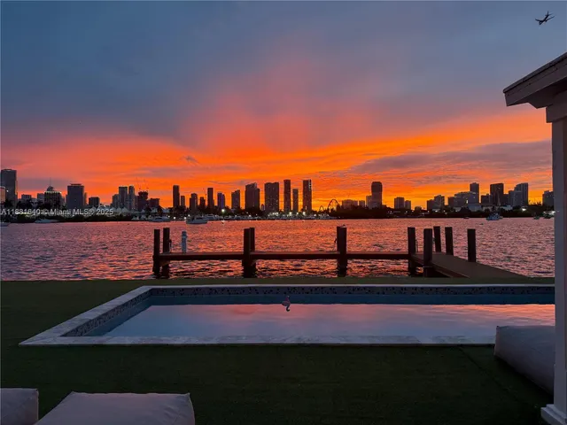 a view of a lake with a big yard