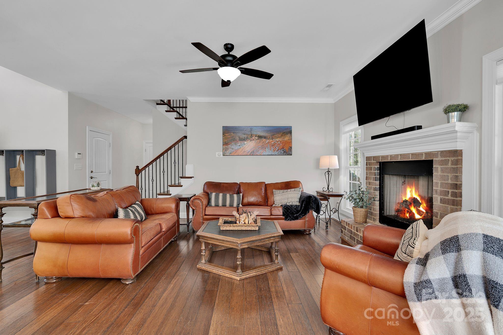 481 Evergreen Road Lake Wylie, SC 29710 - Photo 13 of 45 a living room with furniture and a fireplace
