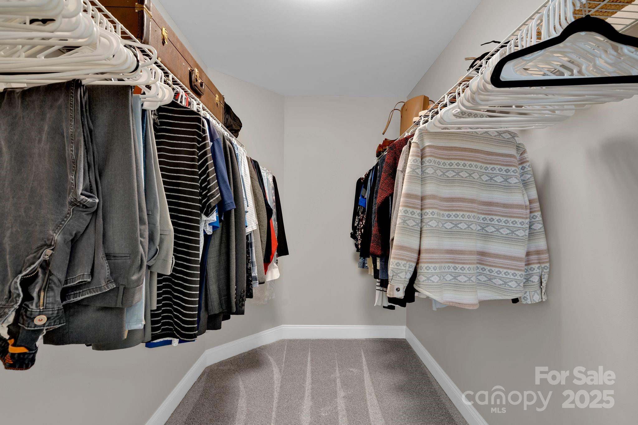 481 Evergreen Road Lake Wylie, SC 29710 - Photo 35 of 45 a view of walk in closet with clothes and shoes