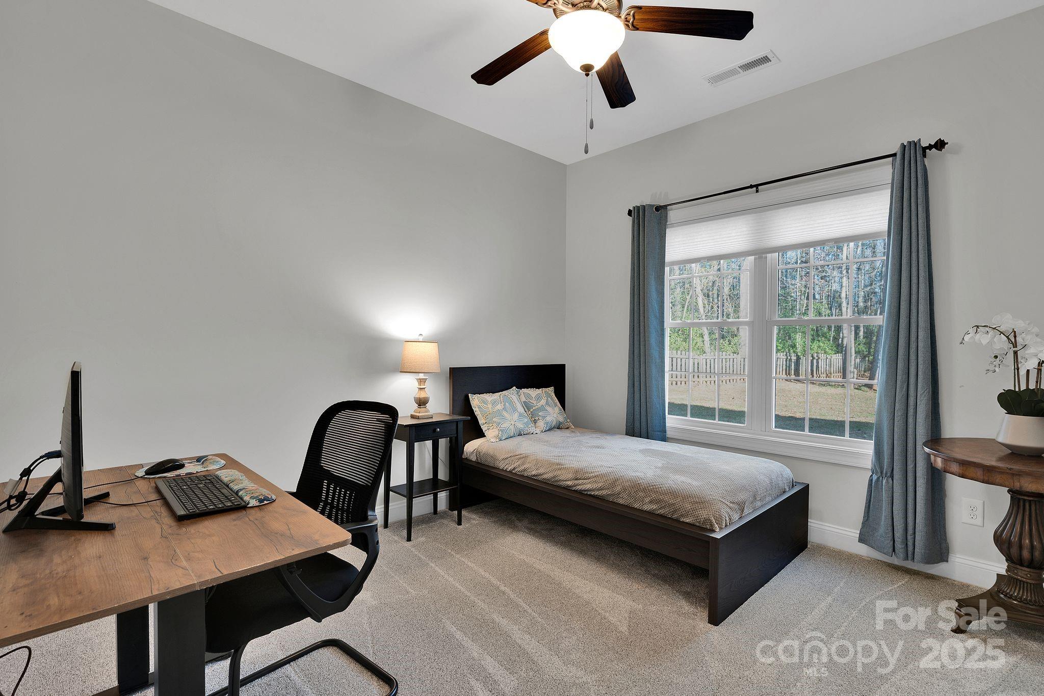 481 Evergreen Road Lake Wylie, SC 29710 - Photo 40 of 45 a bedroom with a bed and a desk