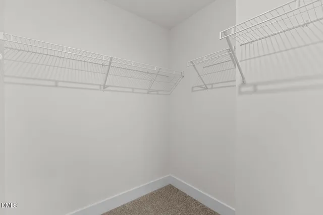 a bathroom with a glass door shower