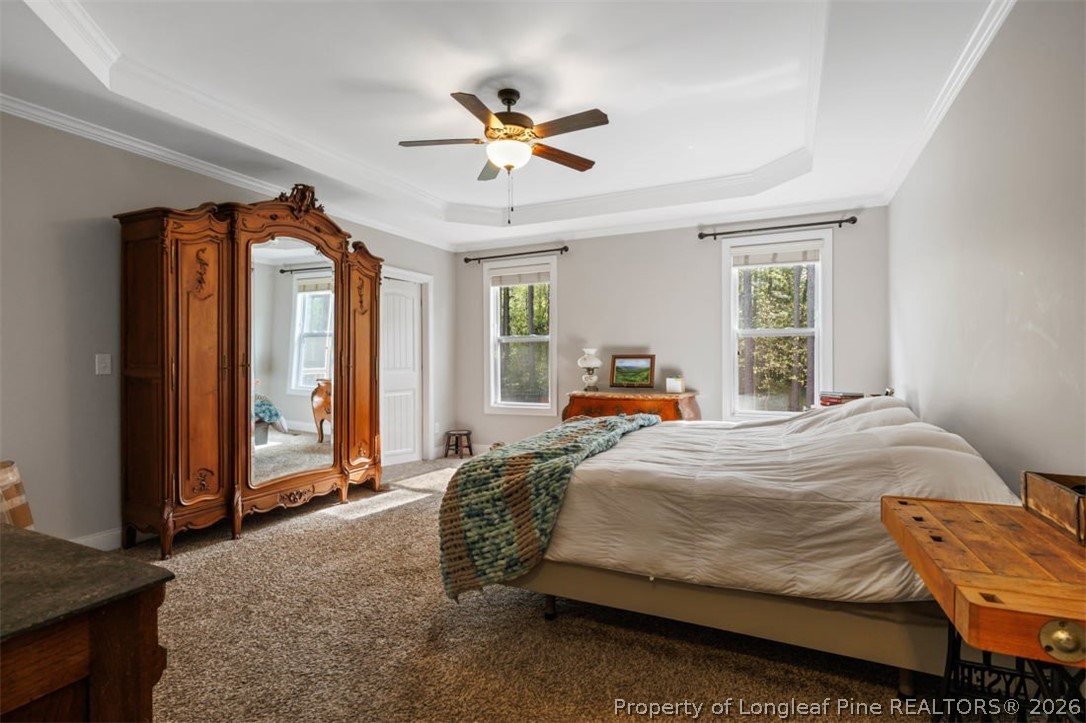 48 Valley Brook Lane Spring Lake, NC 28390 - Photo 17 of 50 a bedroom with a bed and window