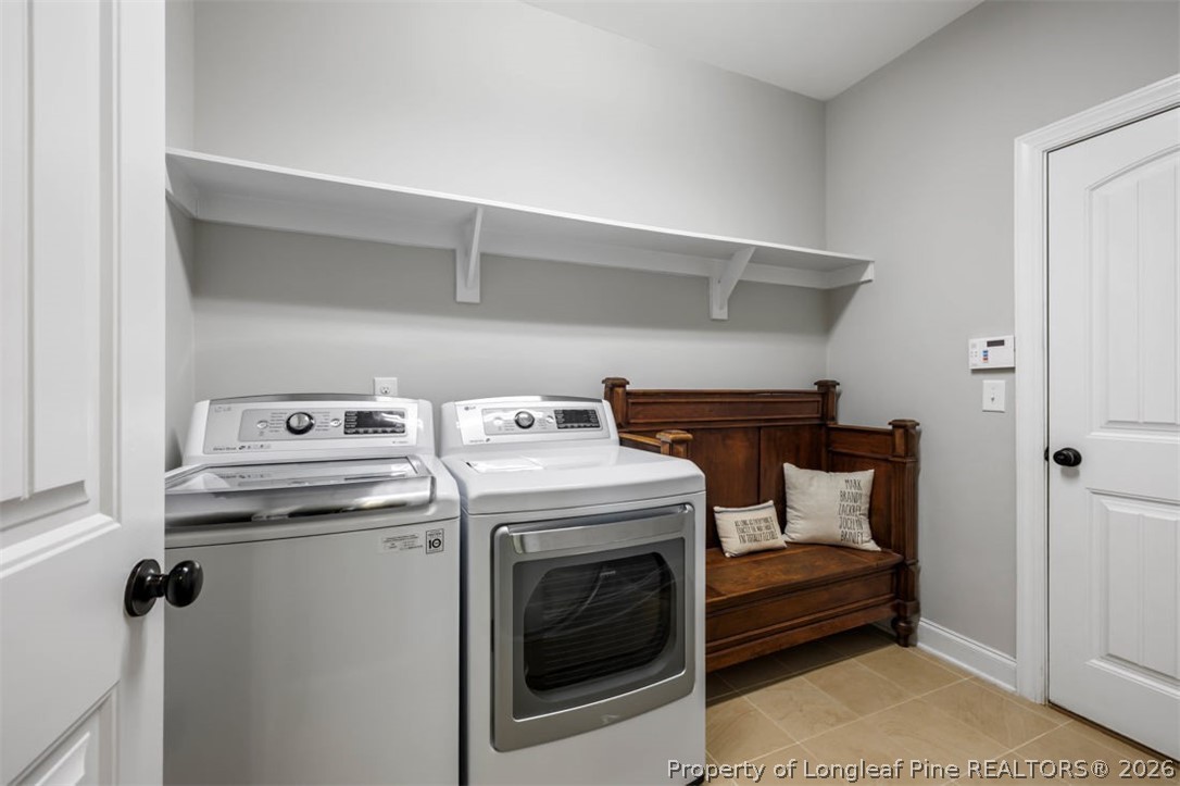 48 Valley Brook Lane Spring Lake, NC 28390 - Photo 23 of 50 a utility room with dryer and washer