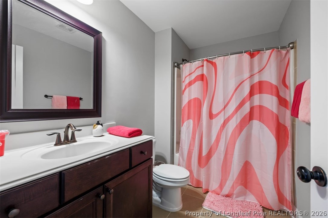 48 Valley Brook Lane Spring Lake, NC 28390 - Photo 31 of 50 a bathroom with a sink and a toilet