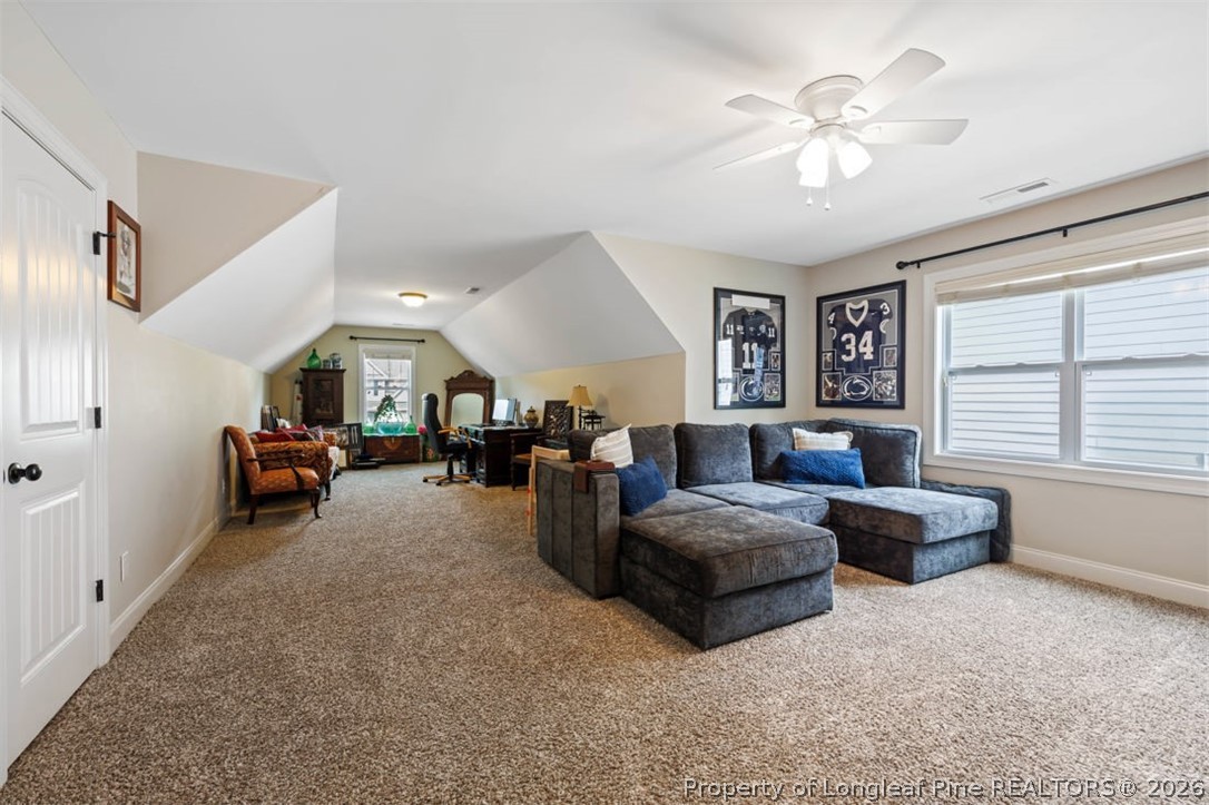 48 Valley Brook Lane Spring Lake, NC 28390 - Photo 32 of 50 a living room with furniture and a large window