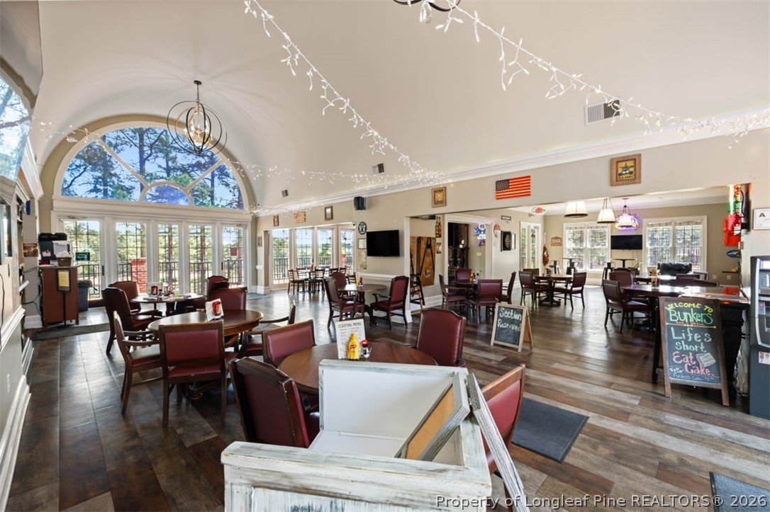 48 Valley Brook Lane Spring Lake, NC 28390 - Photo 45 of 50 a living room with lots of furniture a large window and stainless steel appliances