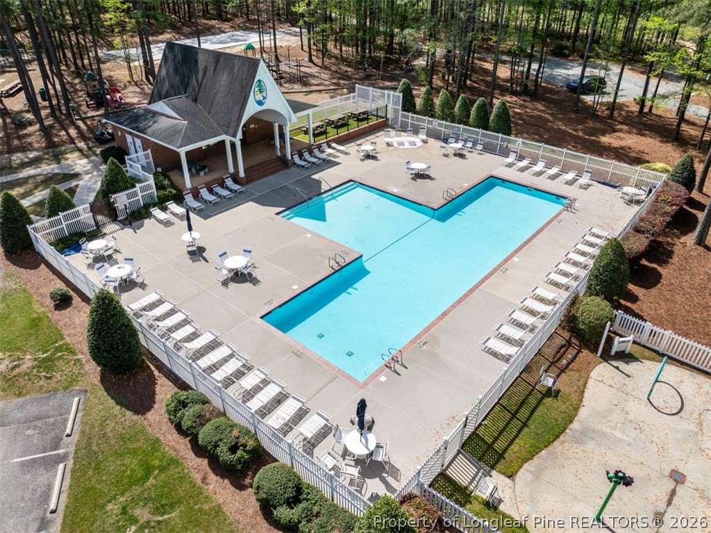 48 Valley Brook Lane Spring Lake, NC 28390 - Photo 46 of 50 a view of a patio with table and chairs