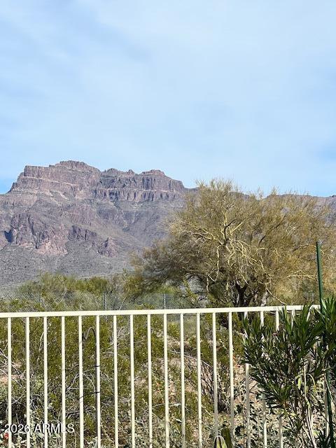 3301 South Goldfield Road, Unit 4028 Apache Junction, AZ 85119 - Photo 41 of 43 a view of a mountain from a window