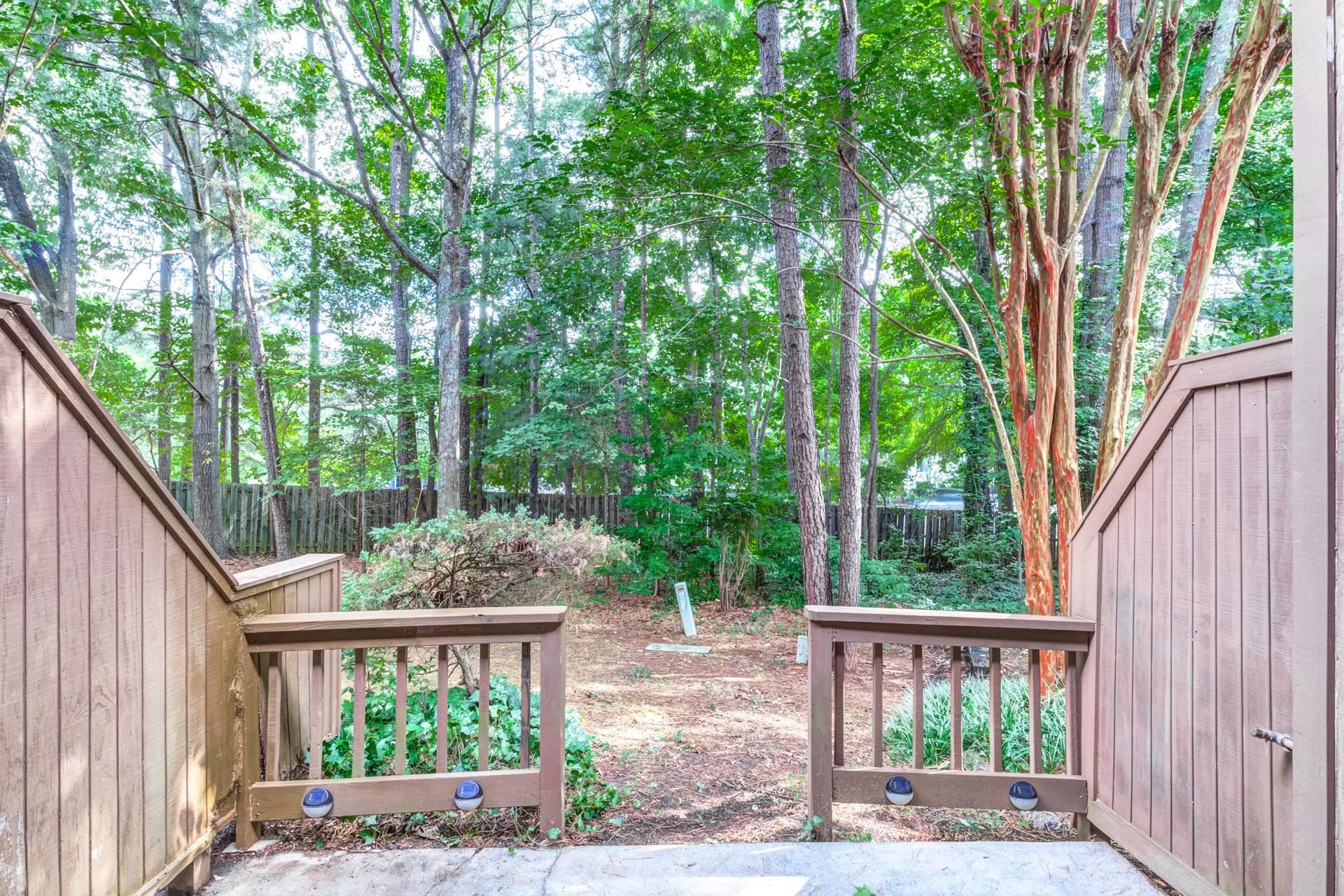 4205 Sunscape Lane Raleigh, NC 27613 - Photo 22 of 23 Private patio with storage. Can you imagine feeding the birds out here? Maybe an herb garden? Patio