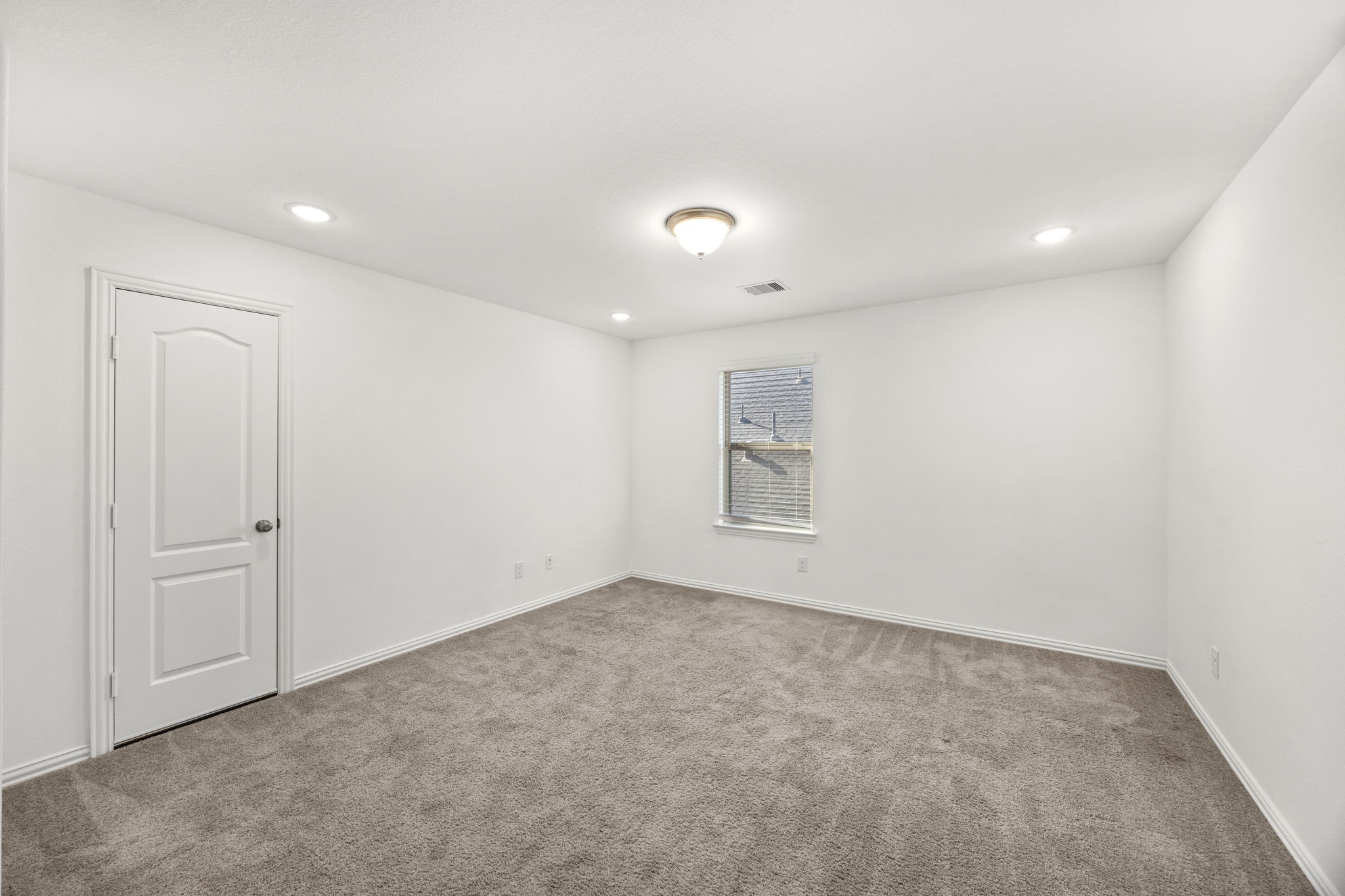 31319 Horseshoe Meadow Bend Lane Fulshear, TX 77441 - Photo 28 of 41 an empty room with windows