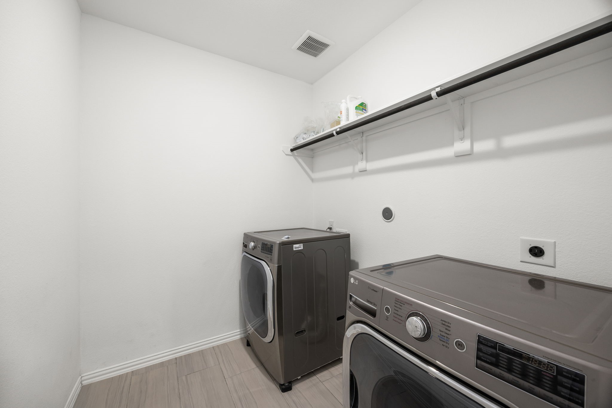 31319 Horseshoe Meadow Bend Lane Fulshear, TX 77441 - Photo 35 of 41 a view of storage and utility room with washer and dryer
