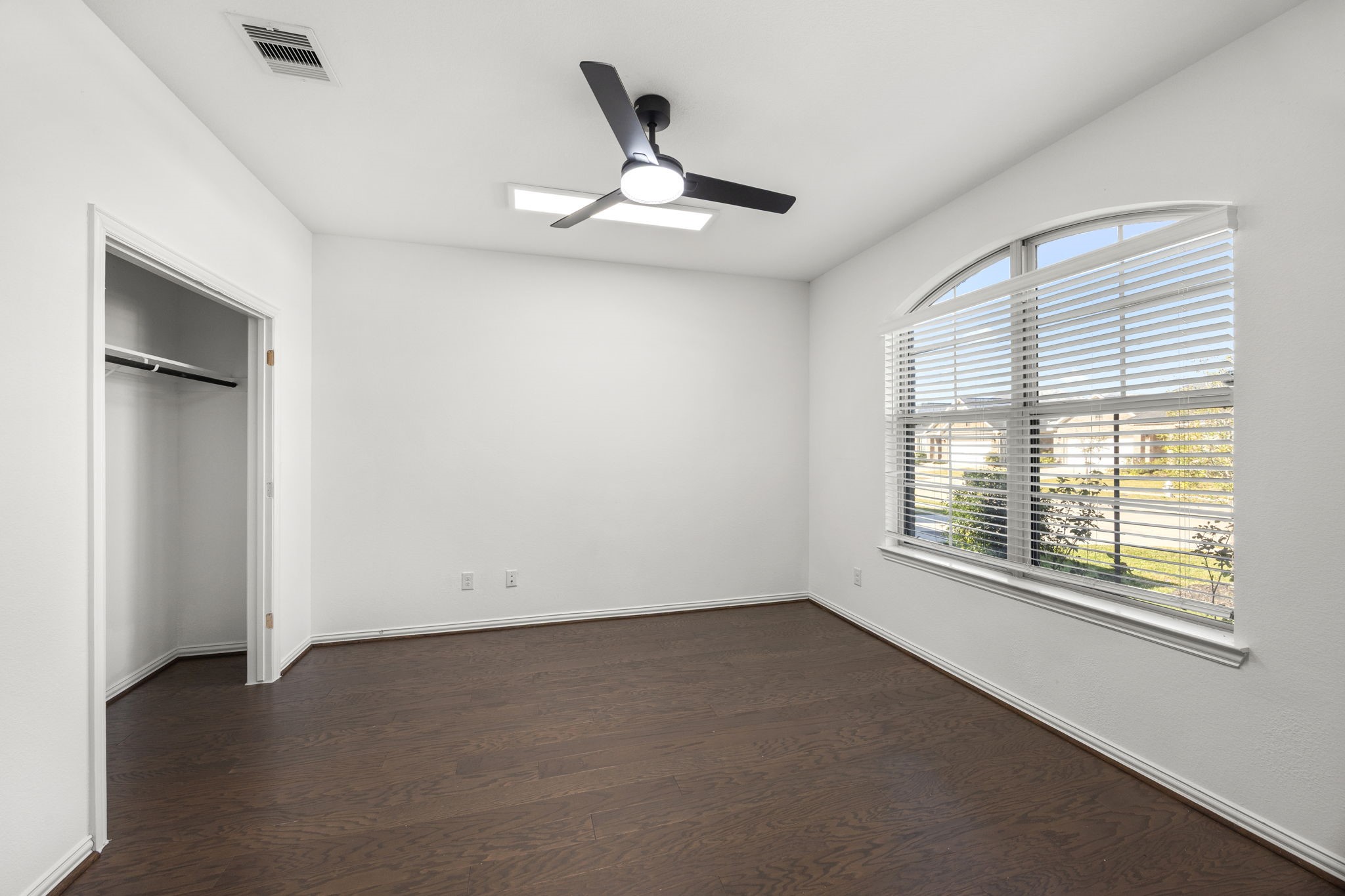 31319 Horseshoe Meadow Bend Lane Fulshear, TX 77441 - Photo 8 of 41 a view of an empty room with a window