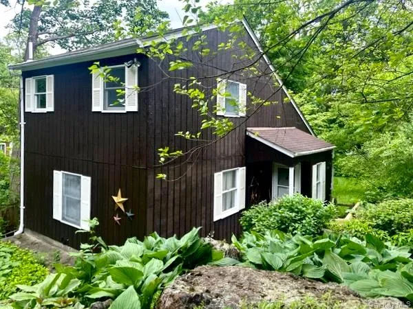 a house view with a outdoor space