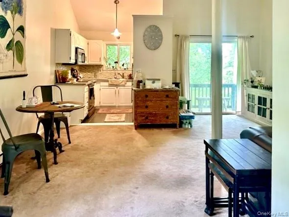 a room with table and chairs