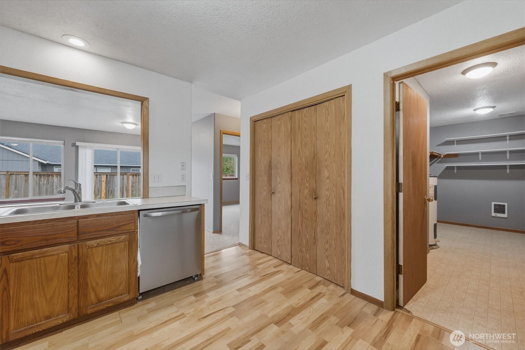 118 Balboa Loop Kelso, WA 98626 - Photo 13 of 35 a view of a kitchen counter space and wooden floor