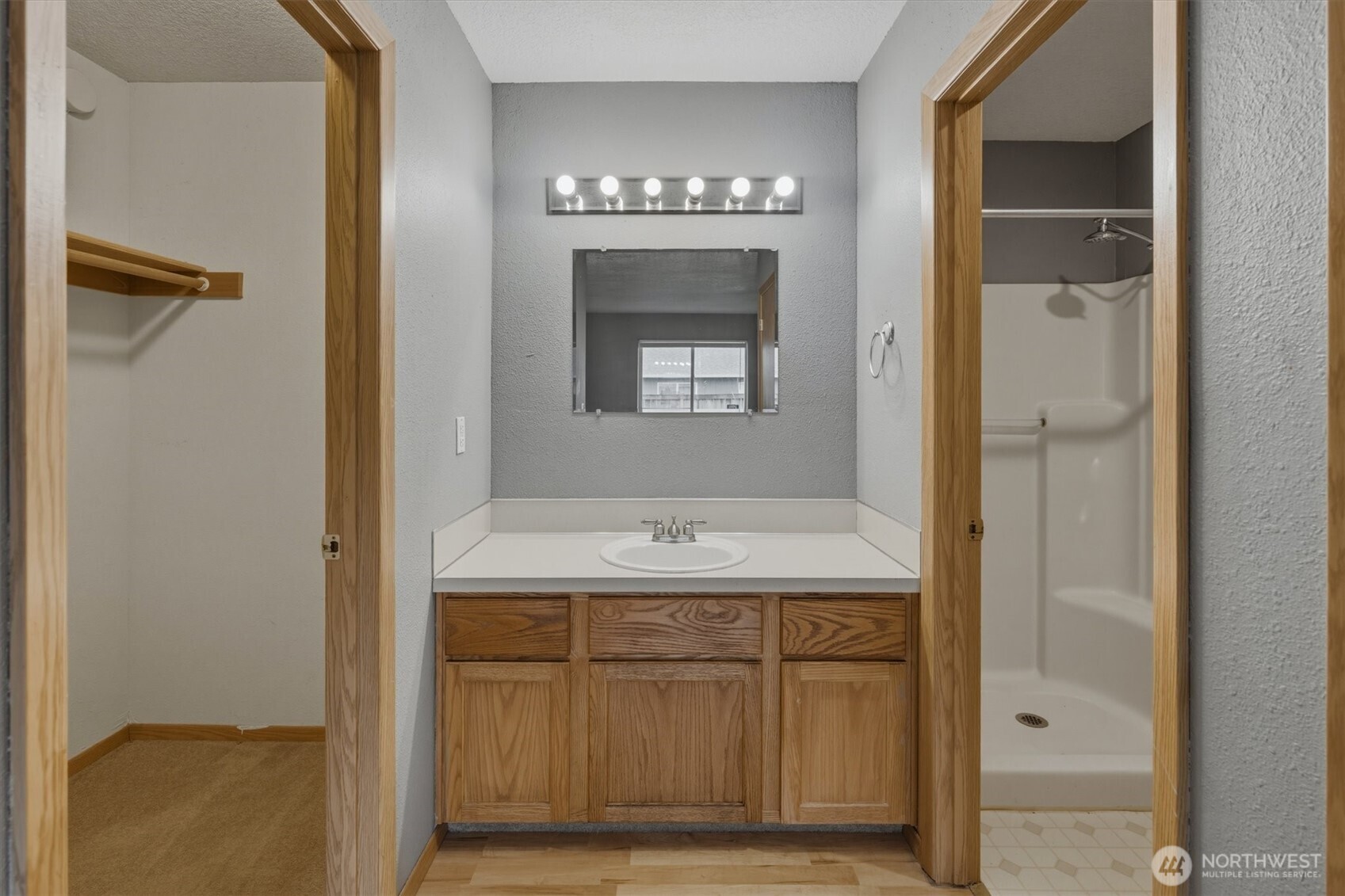 118 Balboa Loop Kelso, WA 98626 - Photo 18 of 35 a bathroom with a sink a vanity and a mirror