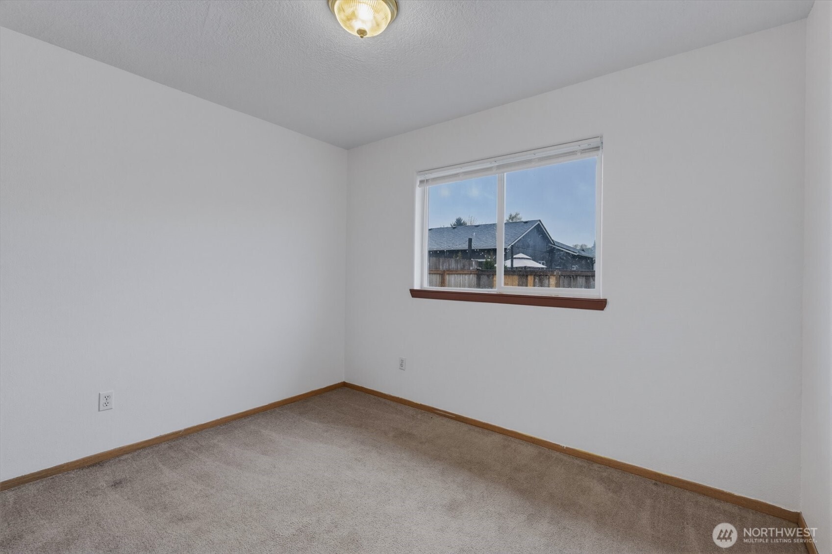118 Balboa Loop Kelso, WA 98626 - Photo 22 of 35 an empty room with a window