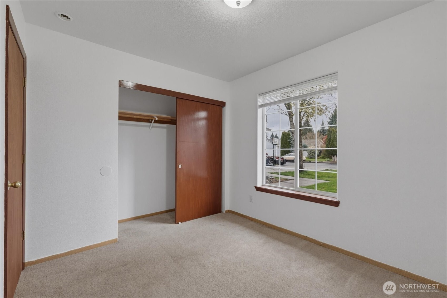 118 Balboa Loop Kelso, WA 98626 - Photo 27 of 35 an empty room with windows and closet