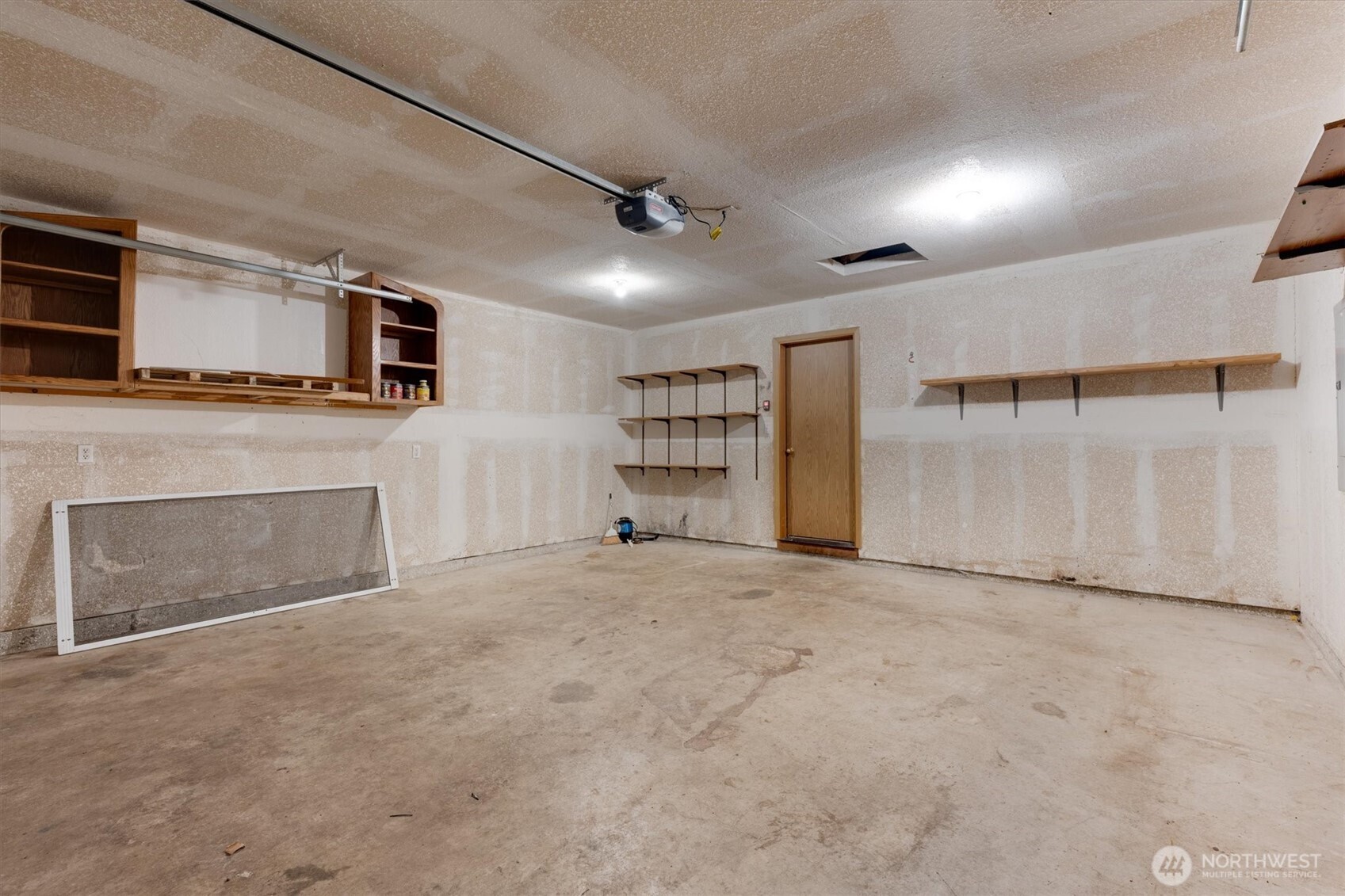 118 Balboa Loop Kelso, WA 98626 - Photo 30 of 35 a view of an empty room with a fireplace and a window
