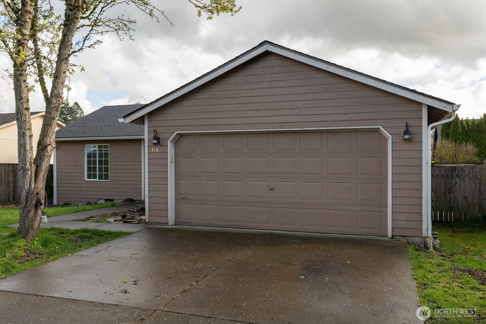 118 Balboa Loop Kelso, WA 98626 - Photo 3 of 35 a front view of a house with a yard