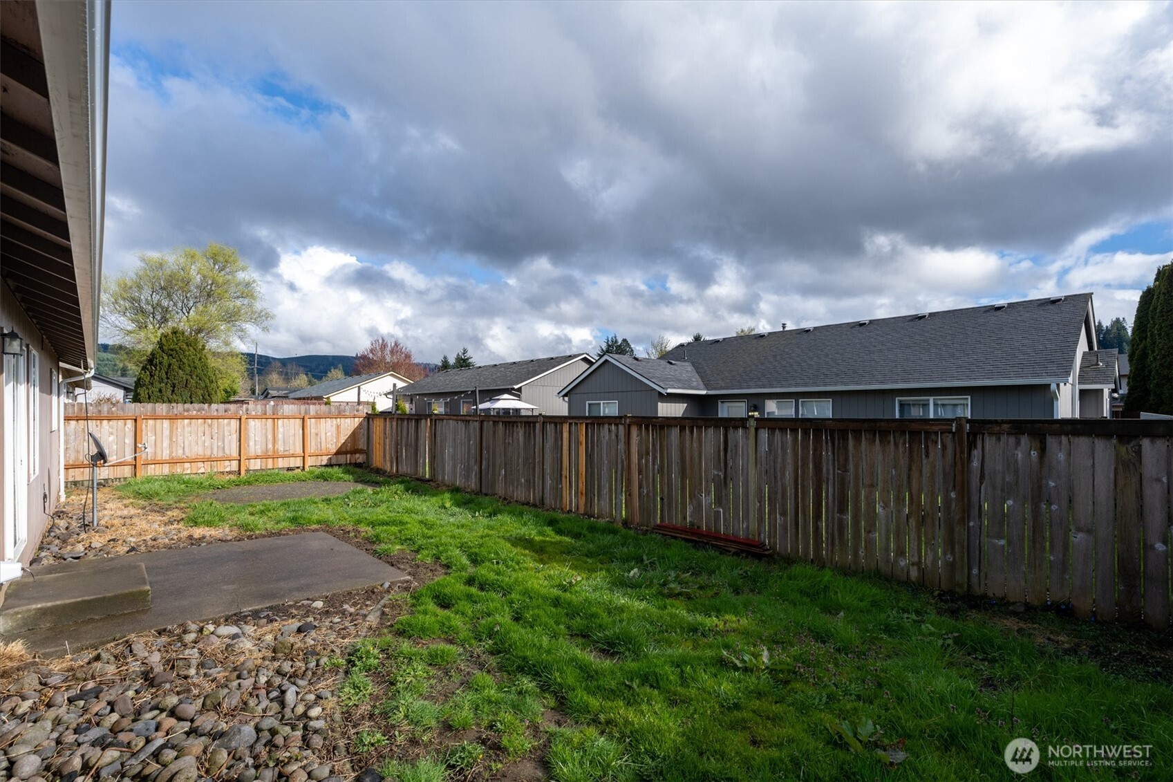118 Balboa Loop Kelso, WA 98626 - Photo 34 of 35 a view of a backyard with wooden fence