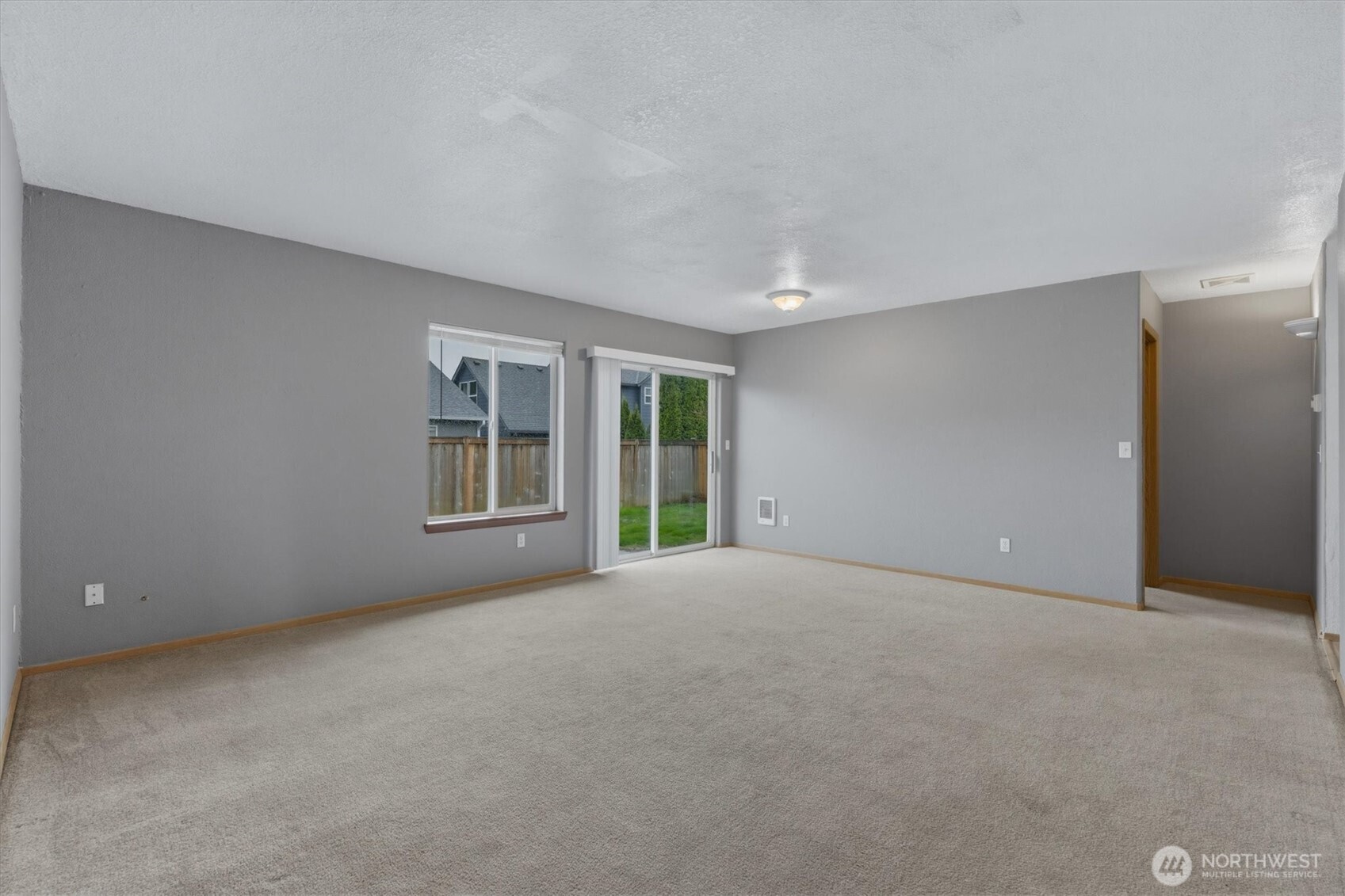118 Balboa Loop Kelso, WA 98626 - Photo 5 of 35 a view of an empty room with a window