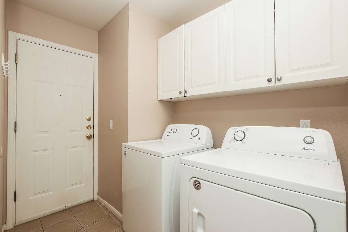 21304 Secretariat Ridge Lane Pflugerville, TX 78660 - Photo 12 of 29 a view of storage and utility room with washer and dryer