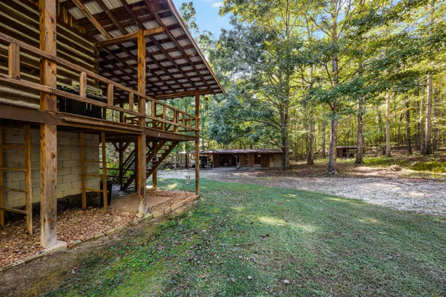 a view of a chairs and tables in the patio
