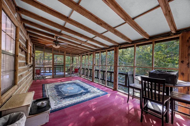 a sitting area with furniture in front of it