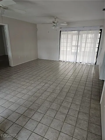 a kitchen with stainless steel appliances a sink and a refrigerator