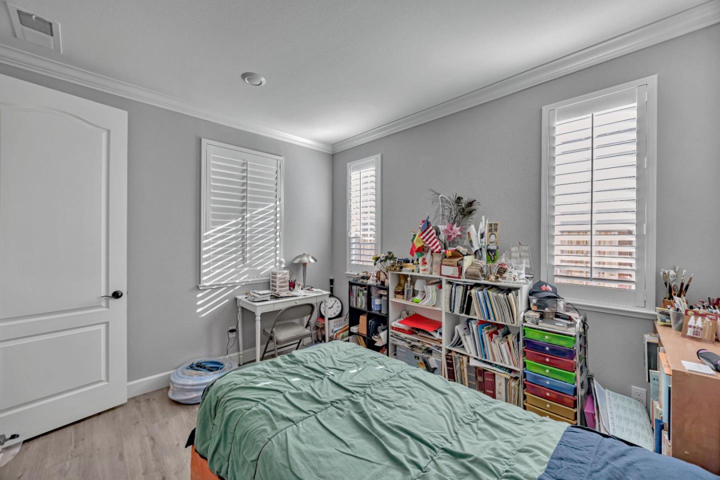 5706 Knight Road Rohnert Park, CA 94928 - Photo 21 of 36 a room that has a bed and a bookshelf in it