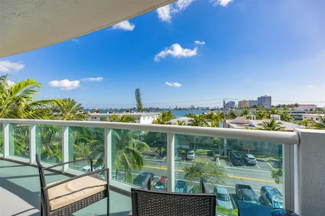 a view of a balcony with lake view