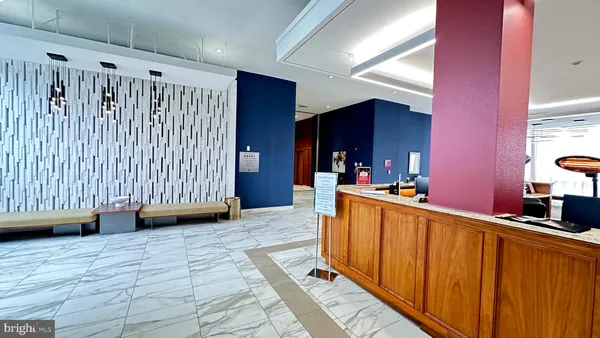 a kitchen with stainless steel appliances a sink and cabinets