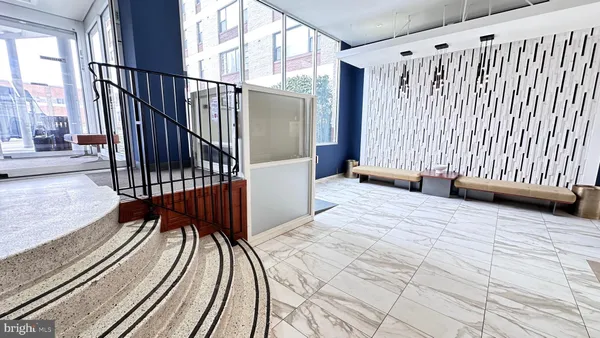 a view of balcony with wooden floor
