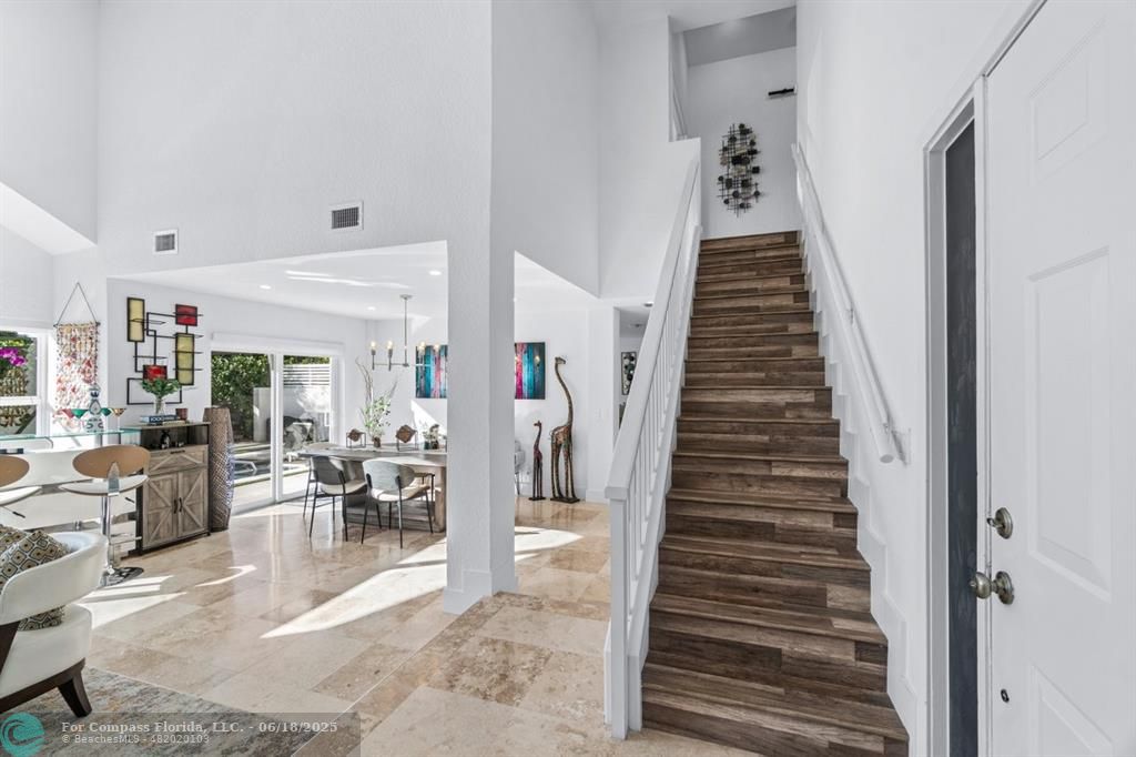2058 Northwest 52nd Street Boca Raton, FL 33496 - Photo 14 of 35 a view of a livingroom with furniture and entryway
