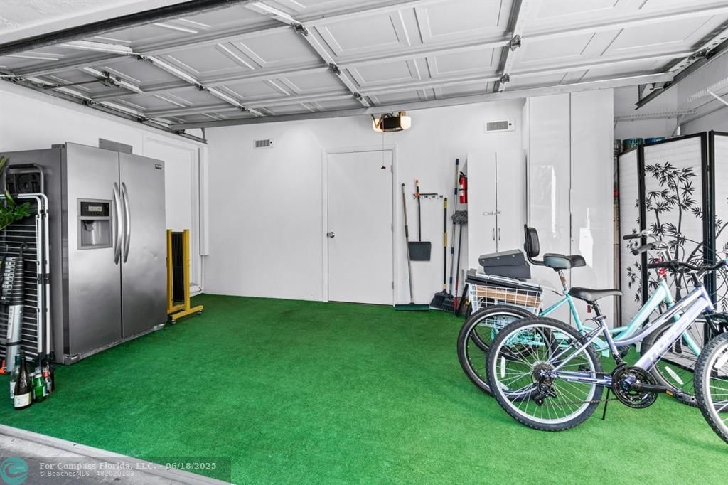 2058 Northwest 52nd Street Boca Raton, FL 33496 - Photo 26 of 35 a view of a backyard with table and chairs