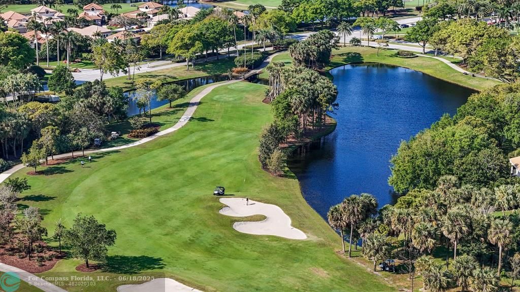 2058 Northwest 52nd Street Boca Raton, FL 33496 - Photo 29 of 35 an aerial view of residential house with outdoor space and swimming pool