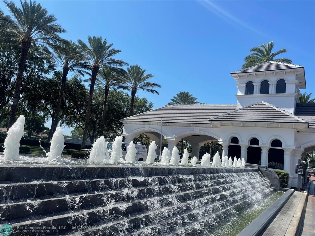 2058 Northwest 52nd Street Boca Raton, FL 33496 - Photo 30 of 35 a front view of a house with garden