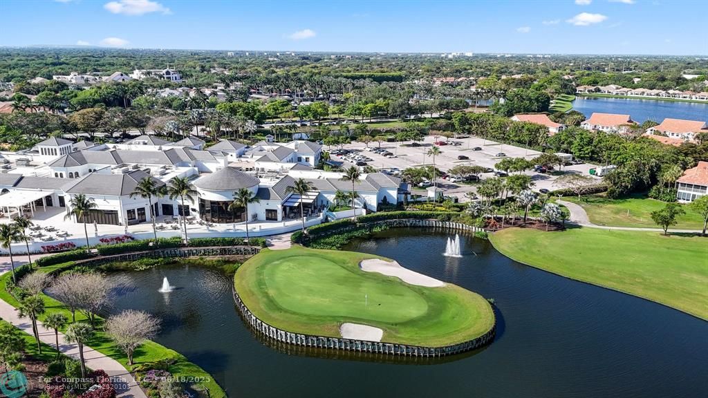 2058 Northwest 52nd Street Boca Raton, FL 33496 - Photo 31 of 35 an aerial view of residential houses with outdoor space and lake view