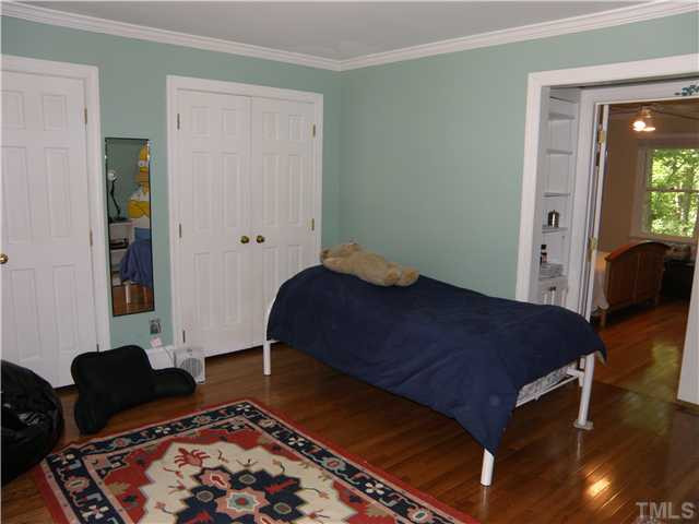 2508 Ashley Court Raleigh, NC 27607 - Photo 10 of 12 Notice that the second bedroom is attached to the master which makes it ideal for nursery,sitting room or office. Nice built-ins. This opening could be closed off and easily converted to additional closet space. Access also thru hallway. Bedroom