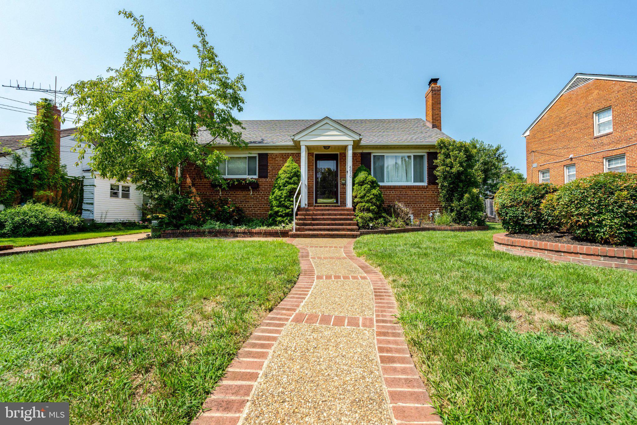 6010 Frederick Street Springfield, VA 22150 - Photo 2 of 15 Adorable home with lush green lawn