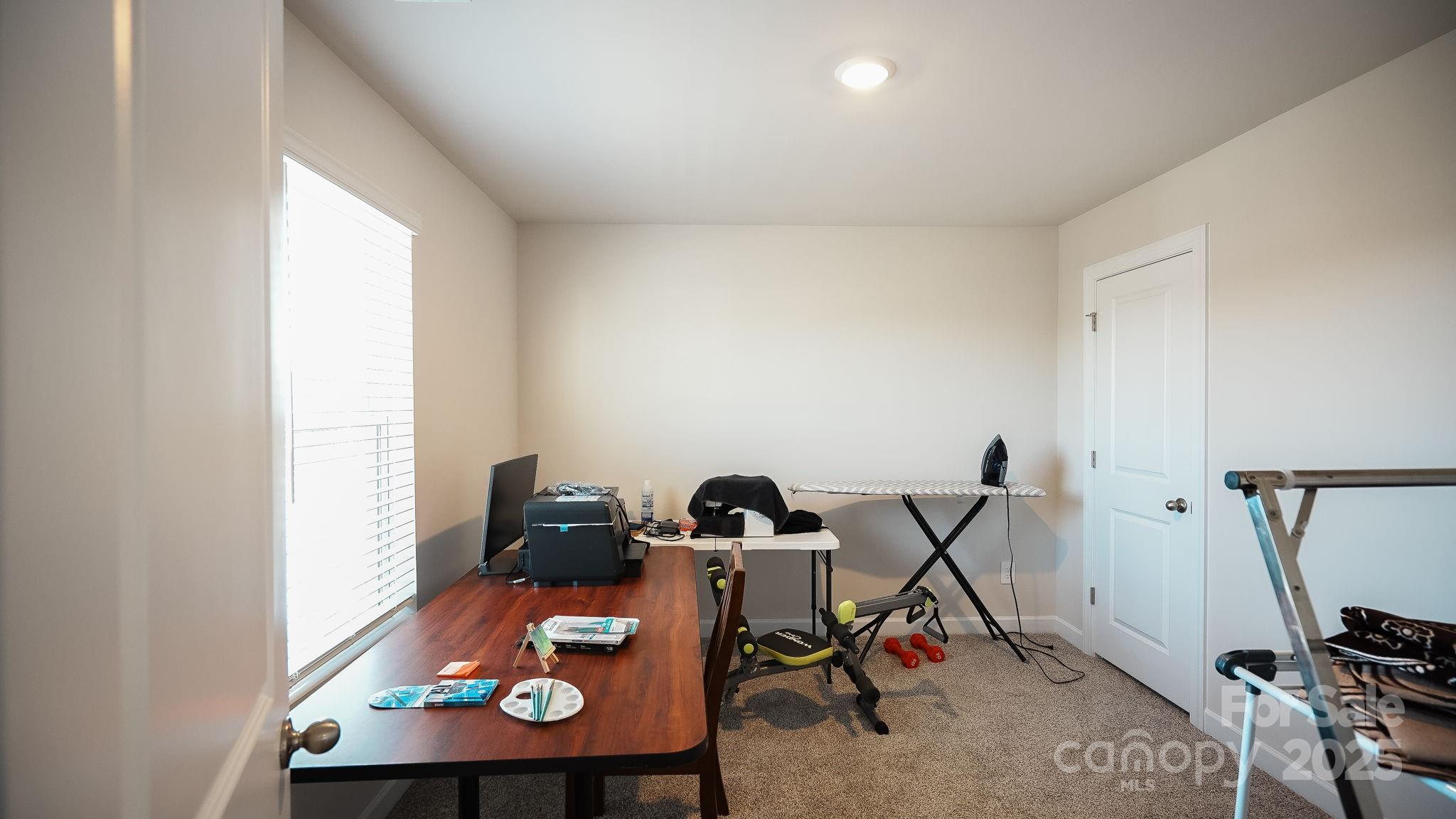 486 Olympia Way York, SC 29745 - Photo 26 of 34 a view of a workspace with furniture