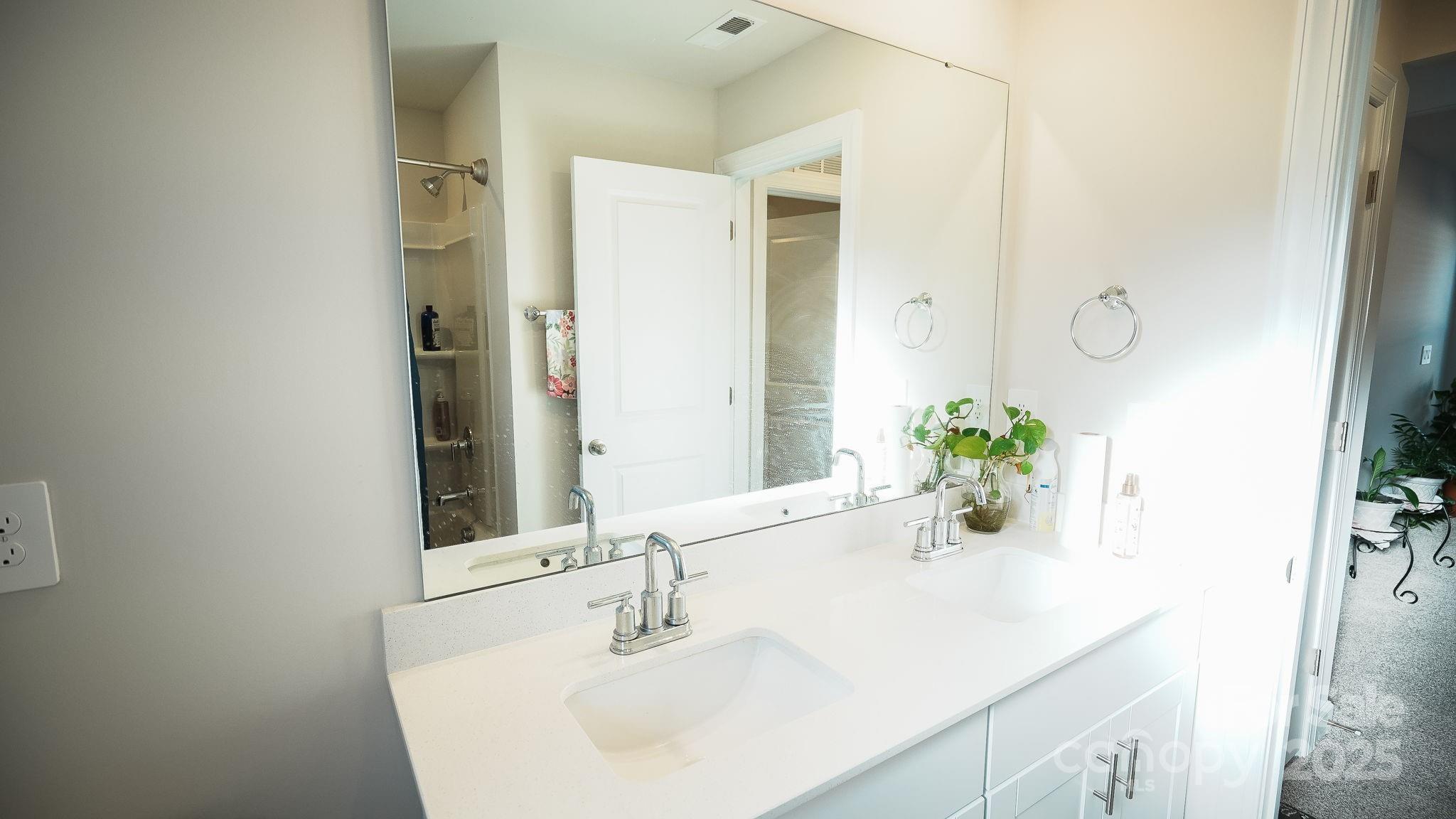 486 Olympia Way York, SC 29745 - Photo 27 of 34 a bathroom with a sink and a mirror