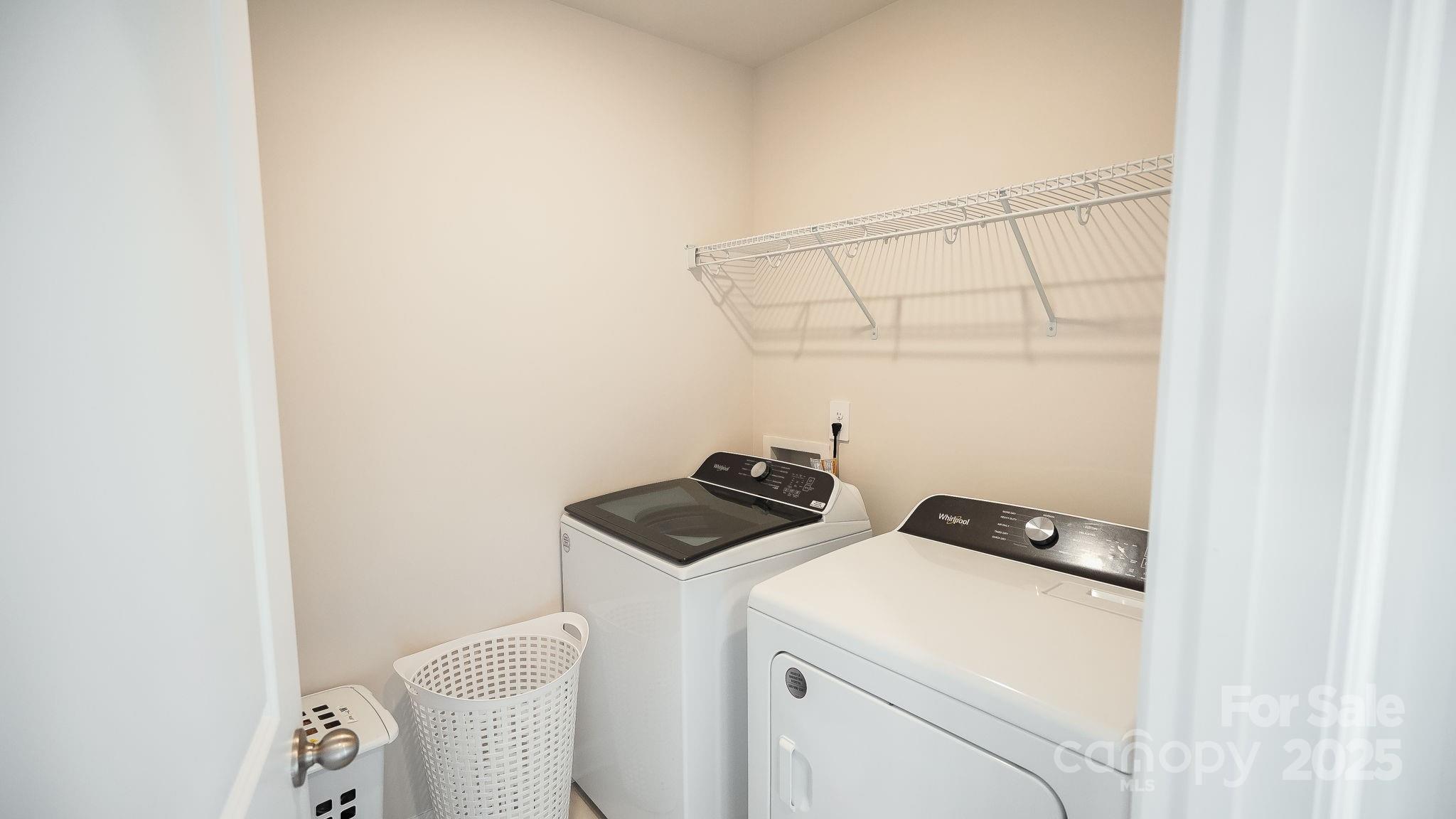 486 Olympia Way York, SC 29745 - Photo 29 of 34 a view of storage and utility room with washer and dryer