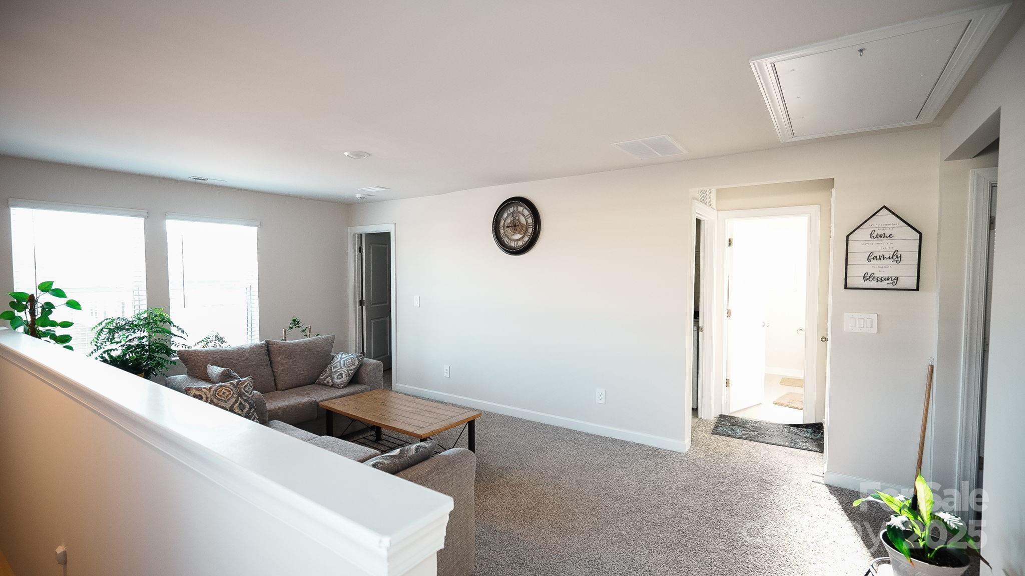 486 Olympia Way York, SC 29745 - Photo 8 of 34 a living room with furniture and window