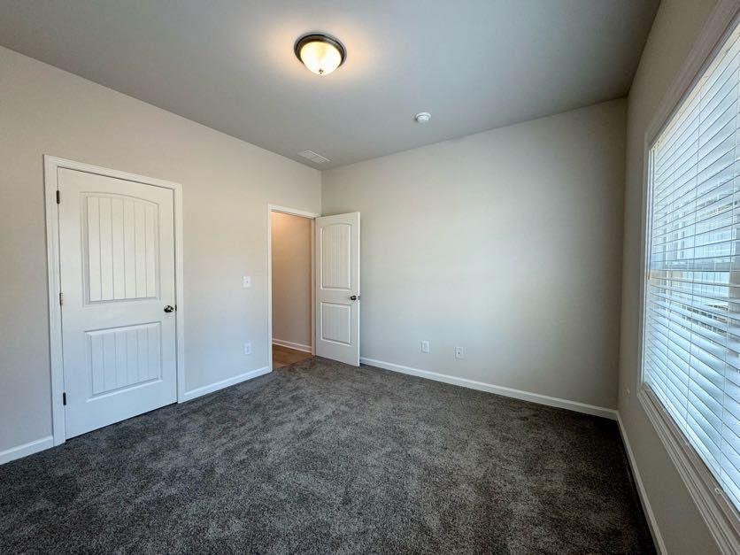 0 Harvest Church Road, Unit 2 Clarkesville, GA 30523 - Photo 16 of 33 an empty room with an entryway and window view