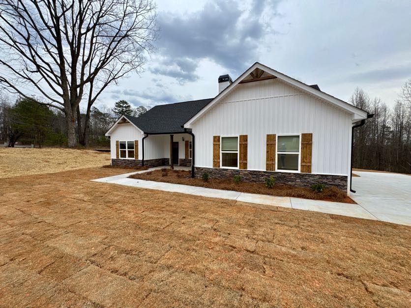 0 Harvest Church Road, Unit 2 Clarkesville, GA 30523 - Photo 5 of 33 a view of a yard in front of a house with large trees