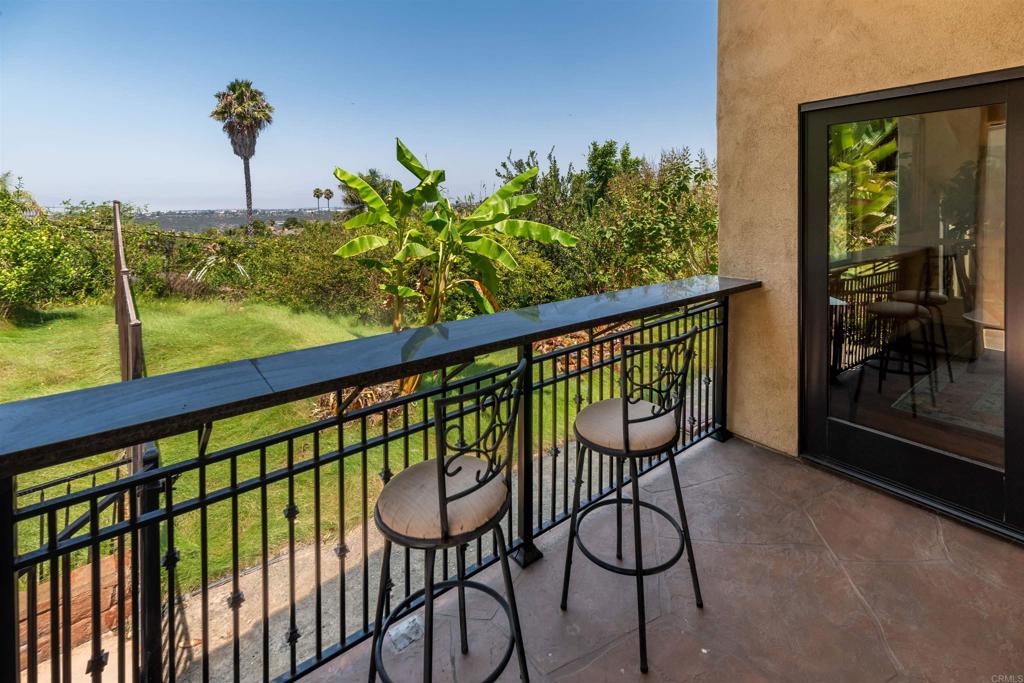 6541 Vispera Place Carlsbad, CA 92009 - Photo 17 of 54 a view of a two chairs in the balcony